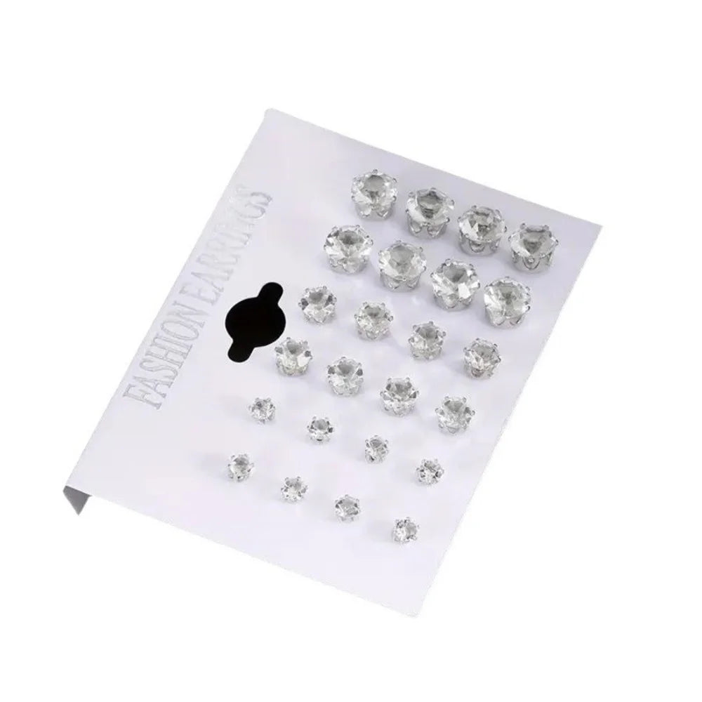 Set de 12 paires de boucles d’oreilles en acier inoxydable couleur argent avec zircon cubique (CZ). Design rond classique, léger et confortable pour un usage quotidien. Convient à toutes les occasions.