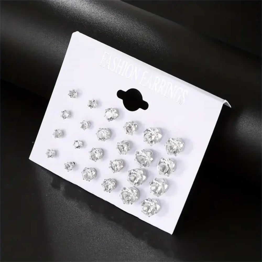 Set de 12 paires de boucles d’oreilles en acier inoxydable couleur argent avec zircon cubique (CZ). Design rond classique, léger et confortable pour un usage quotidien. Convient à toutes les occasions.